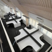 Rayleigh corner desks with desk high pedestals and bespoke desk screens